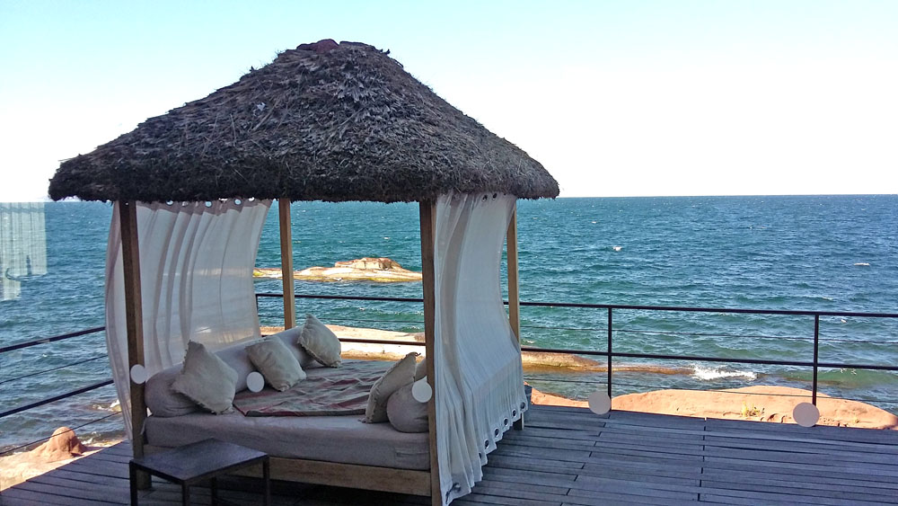 Outdoor relaxtion area at Titilaka, with a stunning view of Lake Titicaca.