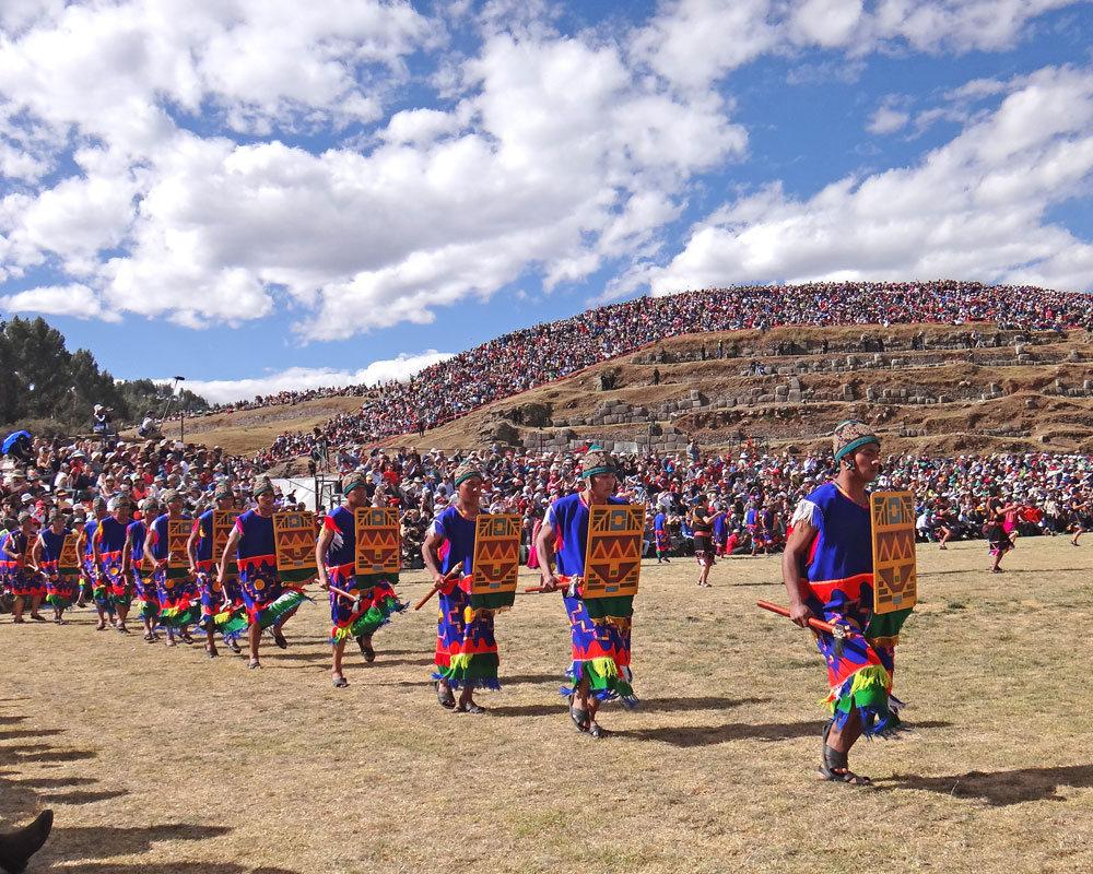 Inti Raymi performers enter the main festival area at Saqsaywaman in Cusco. Phot Credit: Mike Cairney 