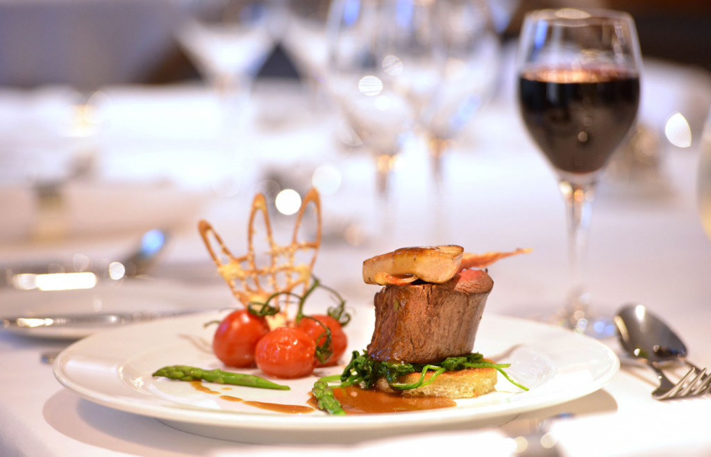 Refined gourmet cuisine aboard the Island Sky luxury cruise ship