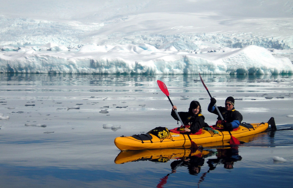 Intrepid explorers can enjoy kayaking amongst the icebergs aboard an Island Sky cruise itinerary