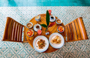 Breakfast poolside at Cayena Beach Villa