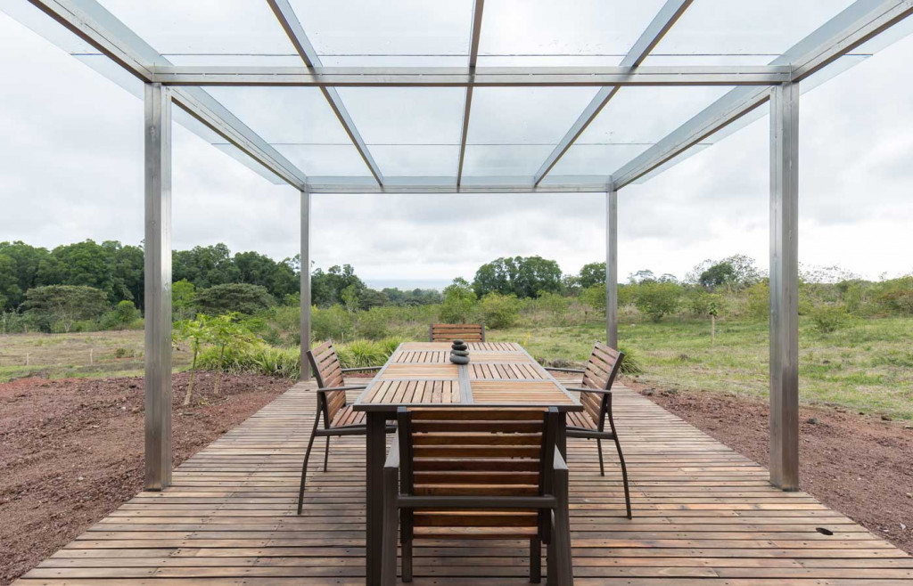 A sleek modern dining area at Montemar Eco-Luxury Villas