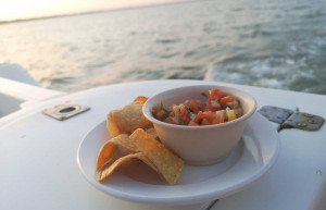 Snacks and drinks aboard a luxury sunset cruise in southern Belize